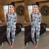 Kvinnors jumpsuits Kvinnor Rompers 2022 Julkvinnor långärmad tryckt bandage jumpsuit romper play -pants casual club wear