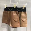 New Wome's PU Shorts с треугольником карманной маркой Zipper Stretch Hight Taista с буквами 3 Colors247w
