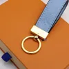 Key chain Buckle lovers Car 2021 Luxury keychains designer unisex real leather stainless steel keychain Women Bags Pendant Accesso295q