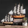 With LED Light Caribbean Black Pearl Sailing Boats Wooden Sailboat Model Home Decoration Accessories for Living Room 210811