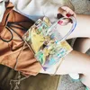 Sac en gelée Nouvelles tendances femmes coloré transparent transparent jelly pvc laser sac à main le sac de messager de la chaîne d'épaule refléter la fête à la plage mini sac à main1