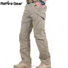 IX9 City Pantalon Cargo Tactique Hommes Combat SWAT Armée Pantalon Militaire Coton Plusieurs Poches Stretch Flexible Homme Pantalon Décontracté XXXL 211201