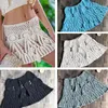 Boho crochet tassel praia mini-saia para mulheres brancas vestido curto lace hollow veja através de saias de renda esbelta sarongues