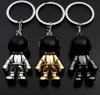 رائد الفضاء Keychain قلادة الإبداع الفضاء روبوت مفتاح سبيكة السيارة سحر رأس هدايا الذهب الأسود الفضة