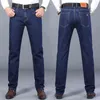 SHAN BAO Automne Classique Ajusté Droit Stretch Denim Jeans Style En Cuir Jeunes Hommes D'affaires Casual Marque 211111