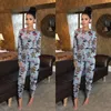 Kvinnors jumpsuits Kvinnor Rompers 2022 Julkvinnor långärmad tryckt bandage jumpsuit romper play -pants casual club wear