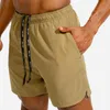 Running shorts män fitness bodybuilding sport jogging byxor gym träning träning sportkläder snabb torr sommar