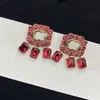 Brincos de cristal de carta designer Lucury G joias femininas brincos de pedra preciosa de alta qualidade para mulheres homens homens brinco de argola D2110222HL