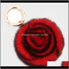 Keychains mode Aessory Fluffy Pompom Keychain Rose Flower Women Bag Charm Real Natural Fur Balls äkta Pom Poms Key Chain Drop Deliver