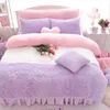 Постилочные наборы устанавливают молоко бархат с четырьмя предметами спальни для девочек-кровать зимняя плюш плюс домашнее текстильное стеганое одеяло.