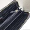 2021 Nouvelle mode Femme Long Portefeuille Embrayage pour femme Zipper Wave Long Portefeuille Portefeuille en cuir noir Carte de crédit Porte-monnaie avec boîte F266D