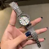 Orologi di marca Donna Donna Ragazza Orologio da polso di lusso in acciaio al quarzo con cinturino in metallo stile cristallo colorato Di32