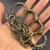 Peso sobre 140g Metal Bronze Knuckle Duster Quatro Ferramenta de Defesa Defesa Fitness Fitness Outdoor Segurança Defesa Defensa Pocket EDC Tools Engrenagem de Proteção