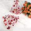 Sacs à cordon en organza coeur rouge gros bonbons organisateur bijoux pack 100pcs / lot 8x10 9x12 10x15 13x18cm sac emballage pochettes roses cadeau saint valentin