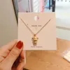 Collane con ciondolo Anno cinese del bue Collana zodiacale Donna Rame color oro Bestiame Clavicola Catena Girocollo Gioielli Regali