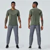 roupas lu yoga masculinas outono e inverno secagem rápida cor sólida esportes e lazer calças fitness soltas com bolsos lu-C621