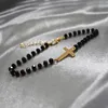 Bracelets de charme 2021 Fashion Exquise Black Beades Cross Bracelet Gold Color Metal Chain For Women Men Party Gifts Jewelry262o