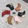 leopard print high heeled boots