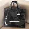 Designer- Paper PVC Shopping Bag Unisex Letter Casual Moda Moda Bolsas Sólidas Designer Clear Beach Propertável Bags femininas221J