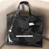 Designer- Paper PVC Shopping Bag Unisex Letter Casual Moda Moda Bolsas Sólidas Designer Clear Beach Propertável Bolsas de Mulheres 276z