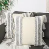 grey tufted sofa