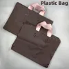 merk Ontwerpers Vrouwen Monogrames Frosted Tote Tassen Plastic Zak originele Hoge Kwaliteit Mannen Kleding Boodschappentassen Mode Geschenkverpakking Schoudertas