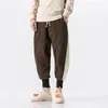 Pantaloni da uomo in stile autunno e inverno peluche in lana di agnello casual pantaloni abbinati a colori cinesi sciolti marrone