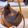 Designer's populaire tas nieuwe schoudertas met hoge capaciteit voor dames met eenvoudige textuur tot messenger bag