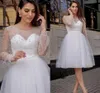 Una linea Sheer Sweetheart Abito da sposa 2022 Perle squisite Lunghezza al ginocchio corto Abiti da sposa da spiaggia Custom Made Vestido De Noiva Mariage