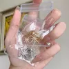 ジュエリーポーチバッグ20pcsミニziplock pvcクリアプラスチックネックレスイヤリングリングアンチ酸化ジッパーセルフシーリングストレージポーチedwi22