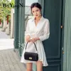 Femmes chemises robe élégante sexy mode col en V haute rue irrégulière coréenne OL mini robes bureau dames blanc noir 210506