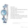 Femme Fashion Clover Robe Watches Bracelets en acier inoxydable Couleur étudiante Bracelet Blue Righestone Quartz Watch Lovers Girl Gift Shell Dial 290W