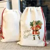 Sac de Noël vierge par sublimation Grand sac cadeau en toile Sacs à bonbons avec cordon de serrage Cadeaux personnalisés réutilisables pour le stockage des paquets de Noël