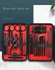 Voltooiing 23 stuks Rvs Manicure Set Pedicure Kit Scissor Tweezer Ear Pick Utility Toe Nail Clipper Facial Care Tool