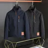 Hiver Fashion Black Down Coats Linner Impression Vestes de bombardiers chauds avec poches Designer Parkas Windbreaker Outwear pour homme