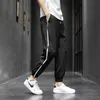 Été mince section glace soie pantacourt version coréenne tendance mouvement pantalons décontractés hommes rayures latérales jogging pantalons de survêtement x0723
