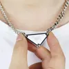 Collier homme bijoux design argent bijoux en acier inoxydable de haute qualité pendentif triangle inversé charme fête étiquette de chien noir blanc mode pendentifs colliers