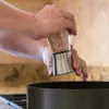 ステンレス鋼の手動塩ペッパーミルグラインダー調味液びんのガラスのキッチンアクセサリーツールK03