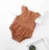 2021 INS Baby Girl Climbing Rompers Ärmlös Solid Färg Ruffles Krage Design 100% Bomull Spädbarn Romper 0-2T