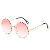 2021 Fashion Tea Gradient Solglasögon Kvinnor Ocean Water Cut Trimmed Lens Flower Sun Glasses Kvinna UV400 Rimless Eyewear4839493