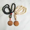Commerce extérieur personnalisé 5 cm disque vierge collier mode créative longue chaîne de vêtements de perles de bois en gros