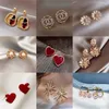 2021 Bijoux 925 Boucles d'oreilles d'aiguille d'argent Tendance de la mode Web Celebrity Perle Tempérament Socialite Pendentif Gros filles montrent mince XZ1688