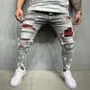 Män slim fit rippade manliga jeans målade mode lapp tiggare byxor jumbo mens blyerts hip hop droppe