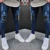 Brand New Arrivals Moda Męskie Męskie Myte Ripped Zniszczone Dżinsy Prosto Vintage Frayed Denim Zipper Streetwear Biker Spodnie X0621