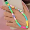 2021 Mooie mobiele telefoon bandjes Charms Strap Lanyard Kleurrijke Glimlach Pearl Zachte Aardewerk Touw Case Hanging Cord Dames