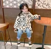 SUSYファッション新しい赤ちゃん女の子の男の子ウィンタージャケットヒョウの毛皮の厚い幼児トッドル暖かいコートの毛皮の服の衣服の衣服1-8Y H0909