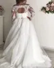 Plus Storlek En linje Elfenben Bröllopsklänning 2022 Bateau Neck Lace Långärmad Applikationer Bow Sash Hollow Back Garden Bride Dresses Country Bridal Gowns Robe de Mariage