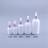 Bouteilles de stockage Pots 10pcs compte-gouttes en verre blanc primaire 10 ml 30 ml 50 ml 100 ml bouteille d'huile essentielle avec bouchon en bambou emballage cosmétique