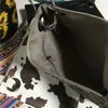 Bolso de mano de cuero PU con diseño de girasol para mujer