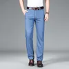 SHAN BAO Jeans in denim leggero e dritto allentato modale di alta qualità Jeans sottili a vita alta da uomo in stile classico estivo giovanile 210531